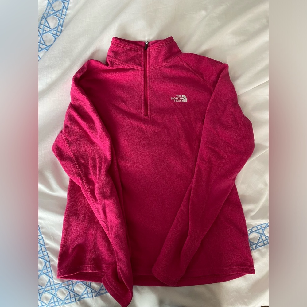 Bright pink North Face fleece pullover